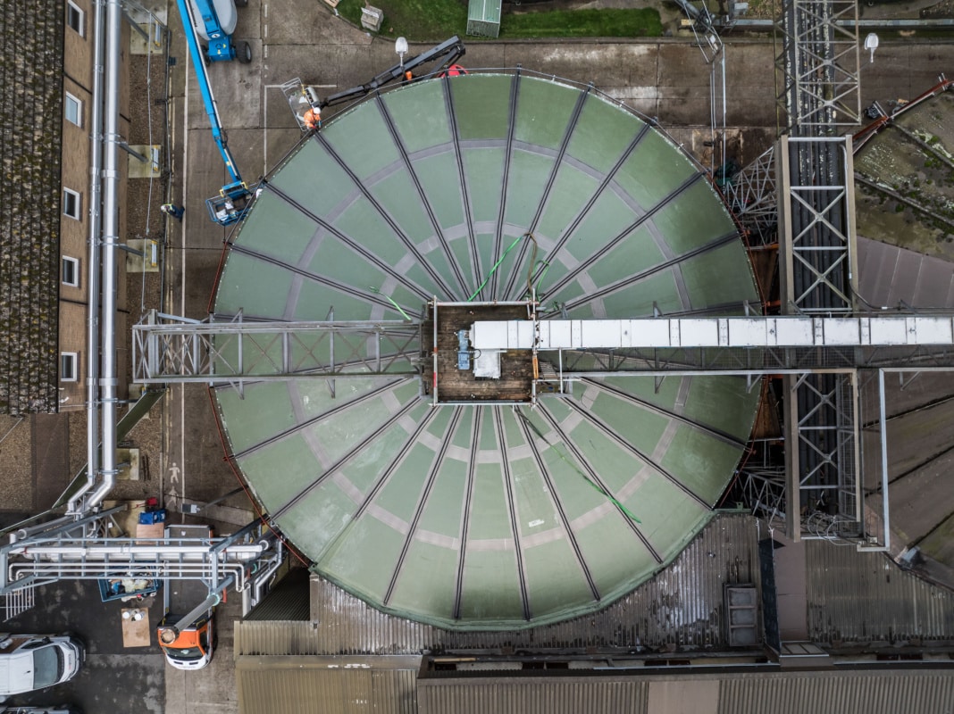 Aerial view of green sustainable GRP tank cover panels for malt manufacturing tank
