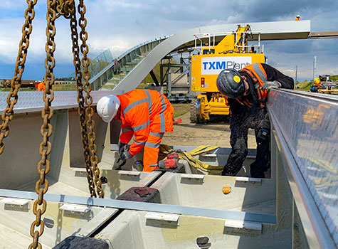 2. Installation of a modular FRP Network Rail footbridge.
