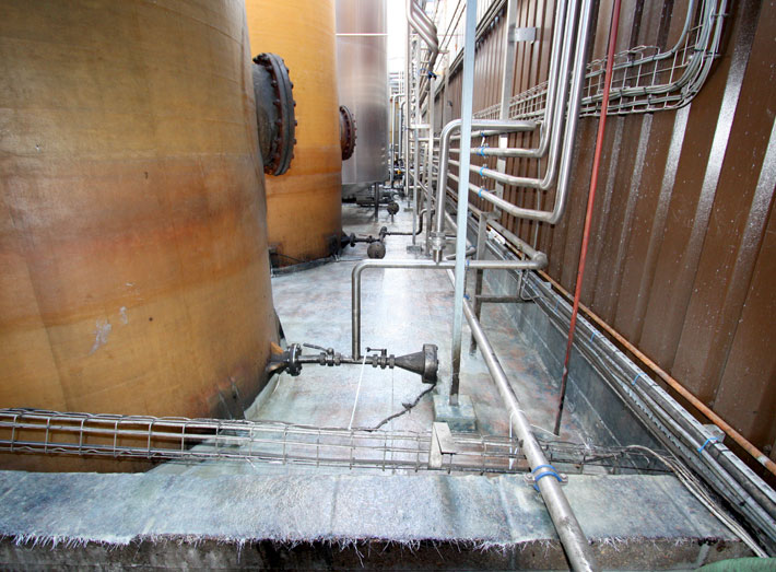 During: fibreglass is applied to the bund wall, base, storage tanks and around pipe areas.